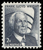 This1966 U.S. postage stamp honors architect Frank Lloyd Wright, foreground, and features the Solomon R. Guggenheim Museum he designed in the background